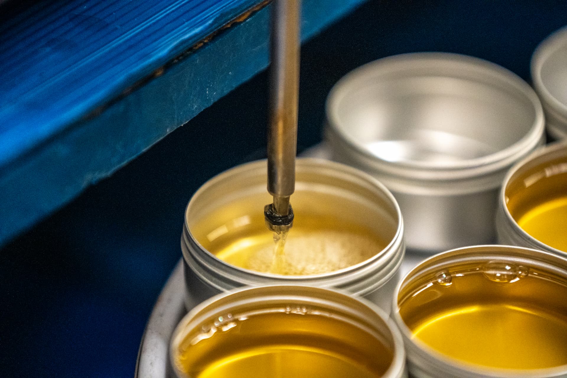 Small batch, hot fill, small volume wax tins for private label brands